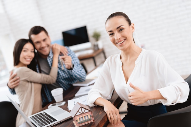 young couple sells house real estate agency 85574 1416